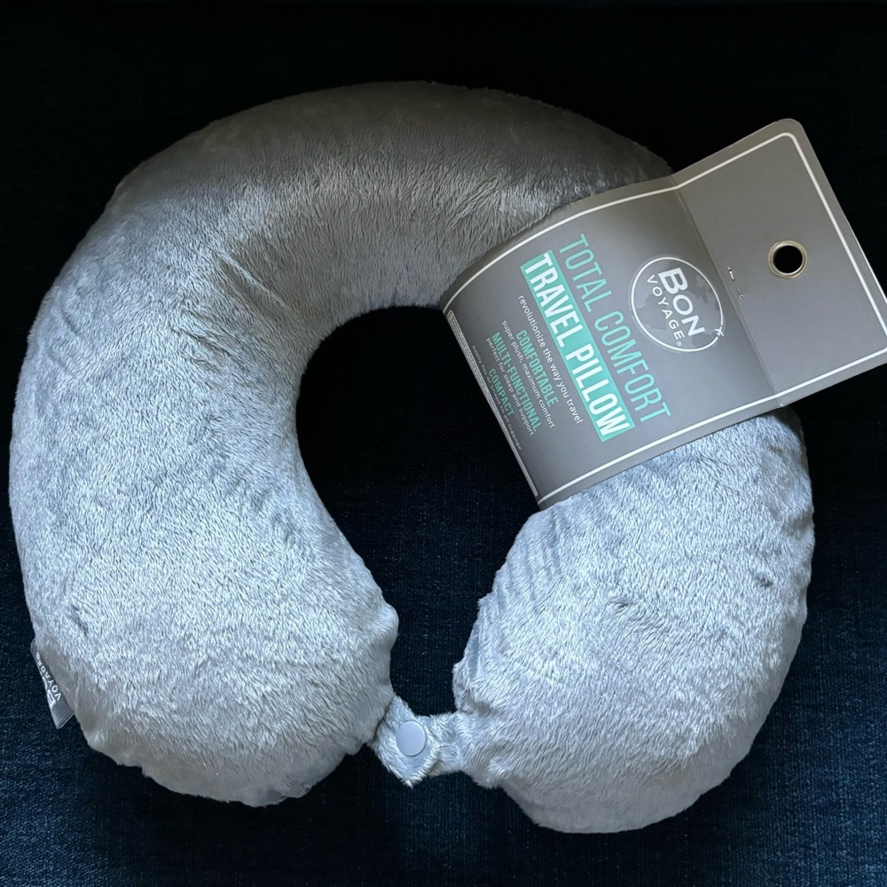 Super plush, travel pillow with front snap